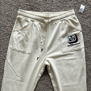 Disney Off-White Joggers with Logo Patch